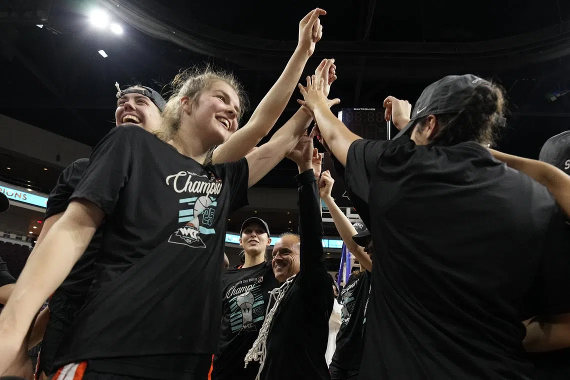 FILE PHOTO: March 11, 2025; Las Vegas, NV, USA; Oregon State Beavers celebrate after defeating the Portland Pilots after the game in the final of the West Coast Conference tournament at Orleans Arena. Mandatory Credit: Kyle Terada-Imagn Images/File Photo