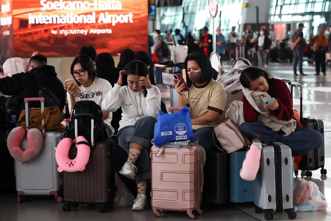 Jakarta airport and others reopen after volcanic ash crisis