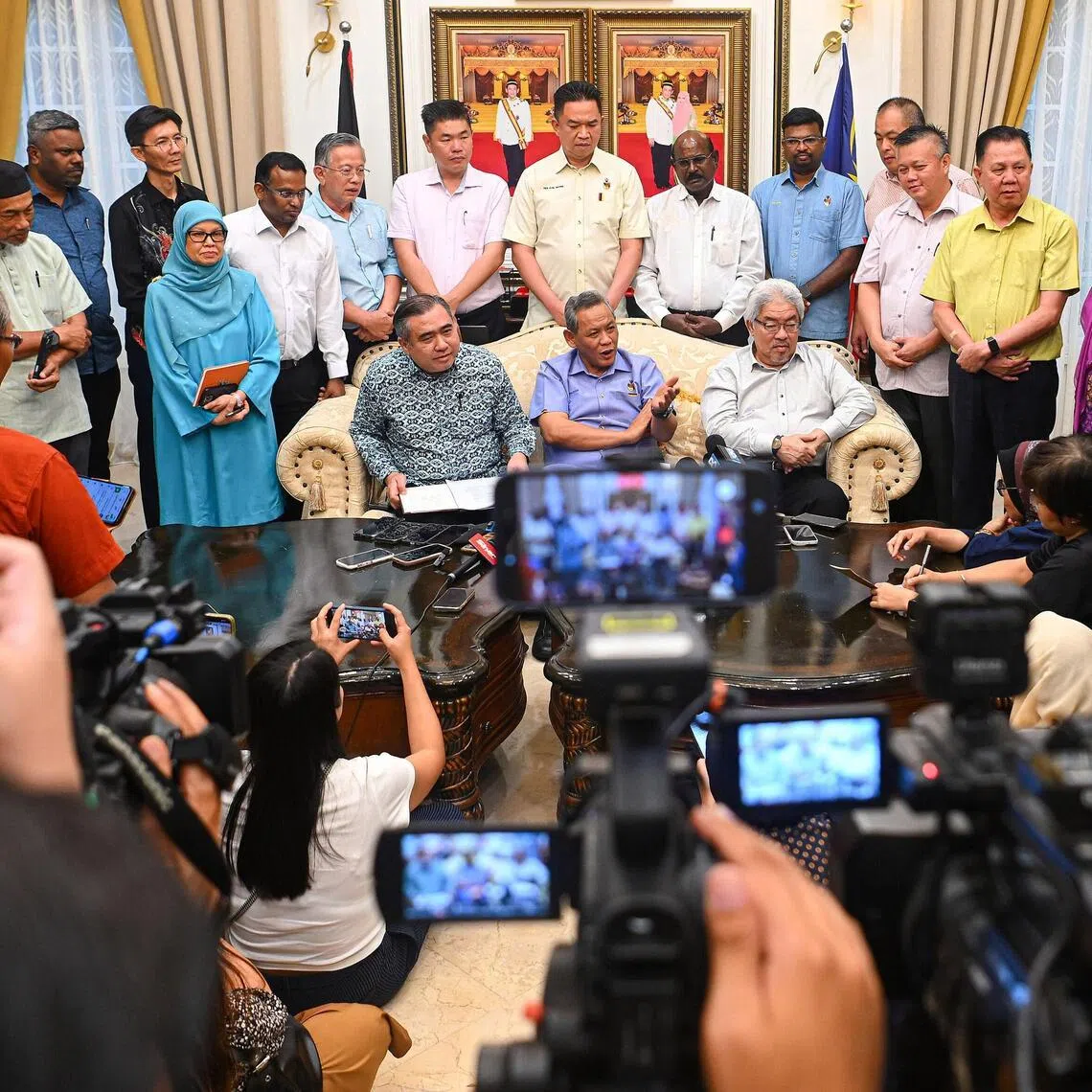 Negeri Sembilan chief minister Aminuddin Harun (centre) retains the support of his Pakatan Harapan colleagues but UMNO's attempt to topple him is set to have national ramifications.
