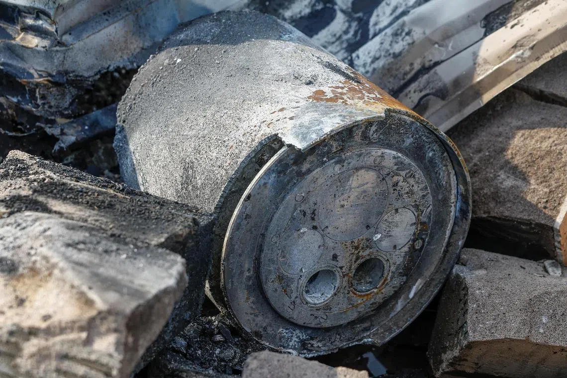 The tail part of a Kh-101 missile, in the debris of a university sports complex in Kyiv, Ukraine, following a Russian strike.