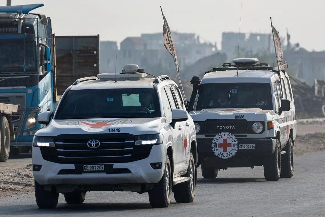 Red Cross vehicles transport the remains of Israeli soldier Hadar Goldin, who was killed in Gaza in 2014.
