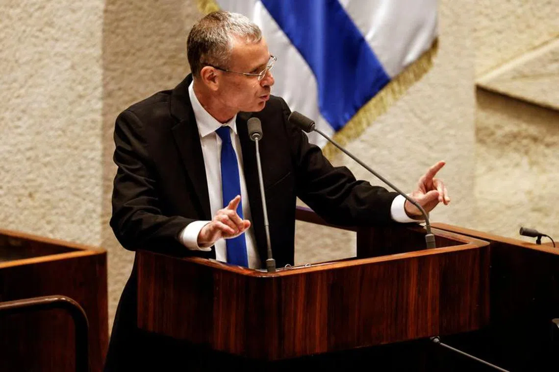 Israeli Justice Minister Yariv Levin addresses the Knesset plenum following a vote on a bill that would limit some Supreme Court power, in Jerusalem July 24, 2023. REUTERS/Amir Cohen/ File Photo