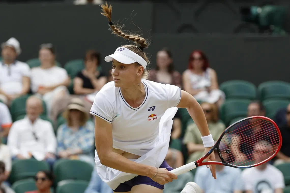 FILE PHOTO: Jul 11, 2024; London, United Kingdom; Elena Rybakina (KAZ) serves against Barbora Krejcikova (CZE)(not pictured) in a ladies' singles semifinal of The Championships Wimbledon 2024 at The All England Lawn Tennis Club. Mandatory Credit: Geoff Burke-USA TODAY Sports/File Photo