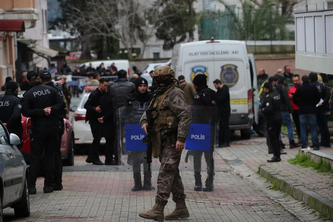 Turkish police stand guard outside the Italian Santa Maria Catholic Church after two masked gunmen were shooting during Sunday service, in Istanbul, Turkey January 28, 2024. REUTERS/Dilara Senkaya