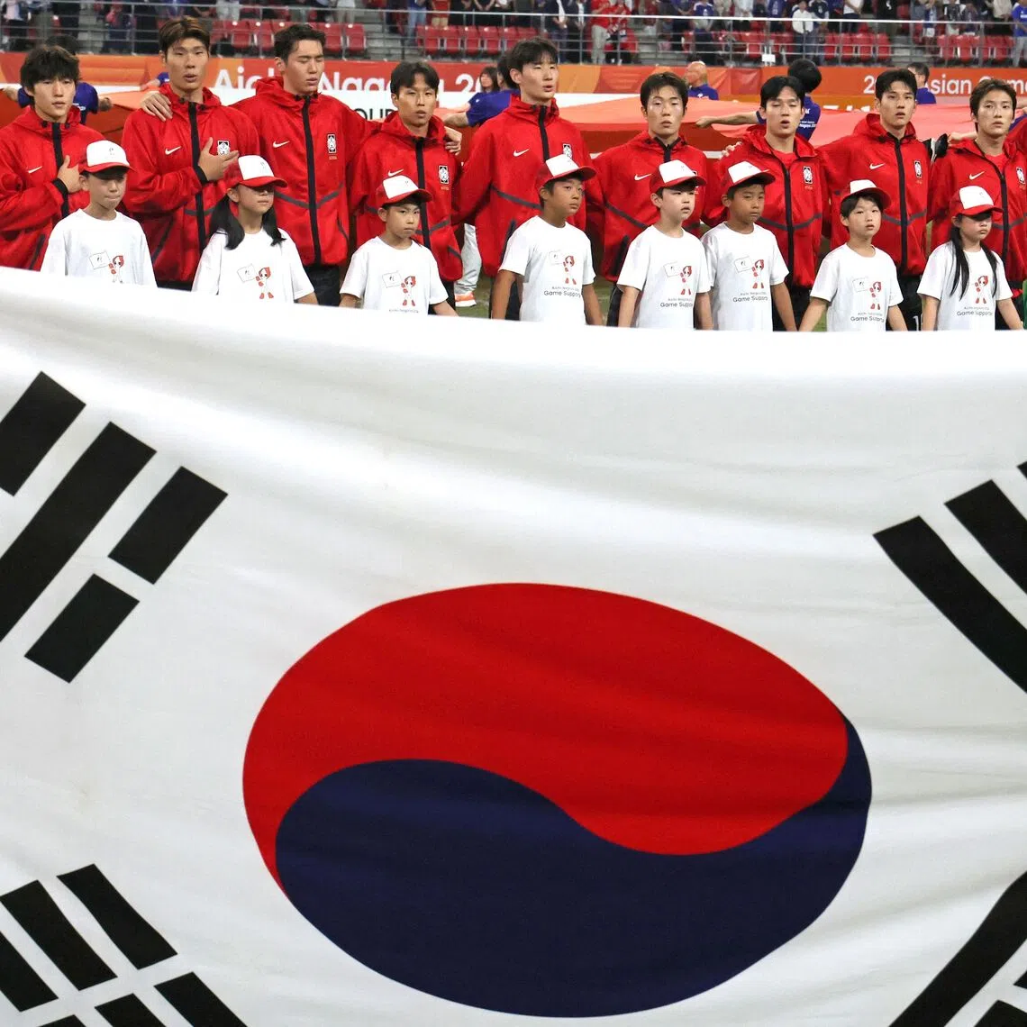 South Korea’s Asian Games gold-winning football team has faced backlash from fans after the behaviour of some players who earned exemptions from mandatory military service.