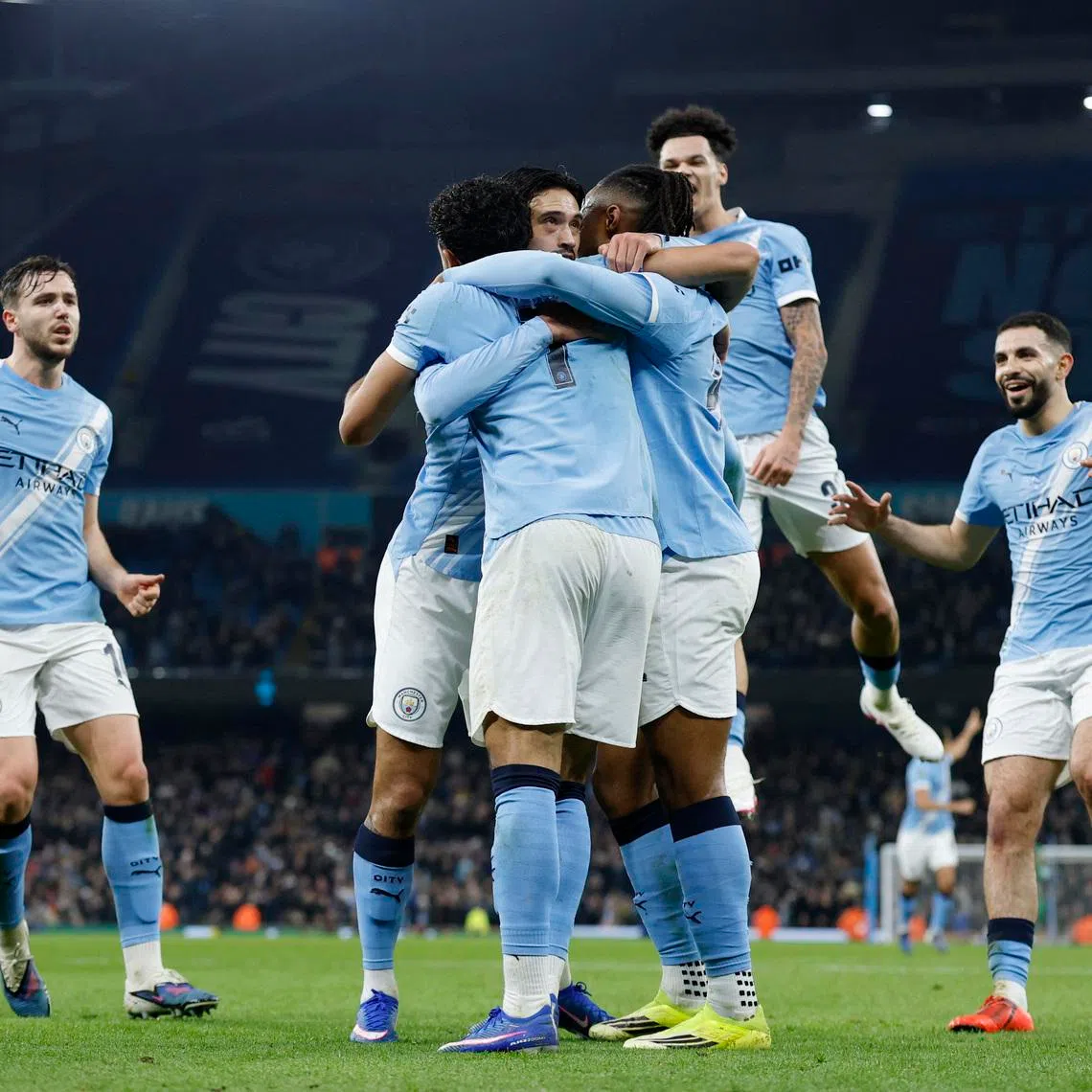 Soccer Football - Carabao Cup - Semi Final - Second Leg - Manchester City v Newcastle United - Etihad Stadium, Manchester, Britain - February 4, 2026 Manchester City's Omar Marmoush celebrates scoring their second goal with teammates Action Images via Reuters/Jason Cairnduff