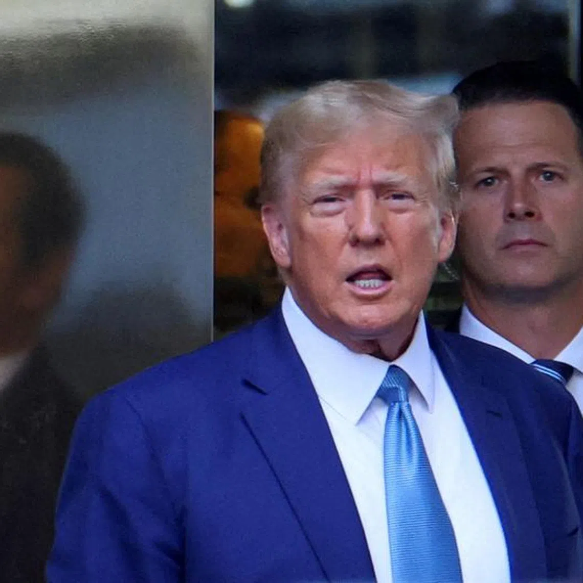 FILE PHOTO: Former U.S. President Donald Trump departs from Trump Tower to give a deposition to New York Attorney General Letitia James who sued Trump and his Trump Organization, in New York City, U.S., April 13, 2023. REUTERS/Mike Segar/File Photo