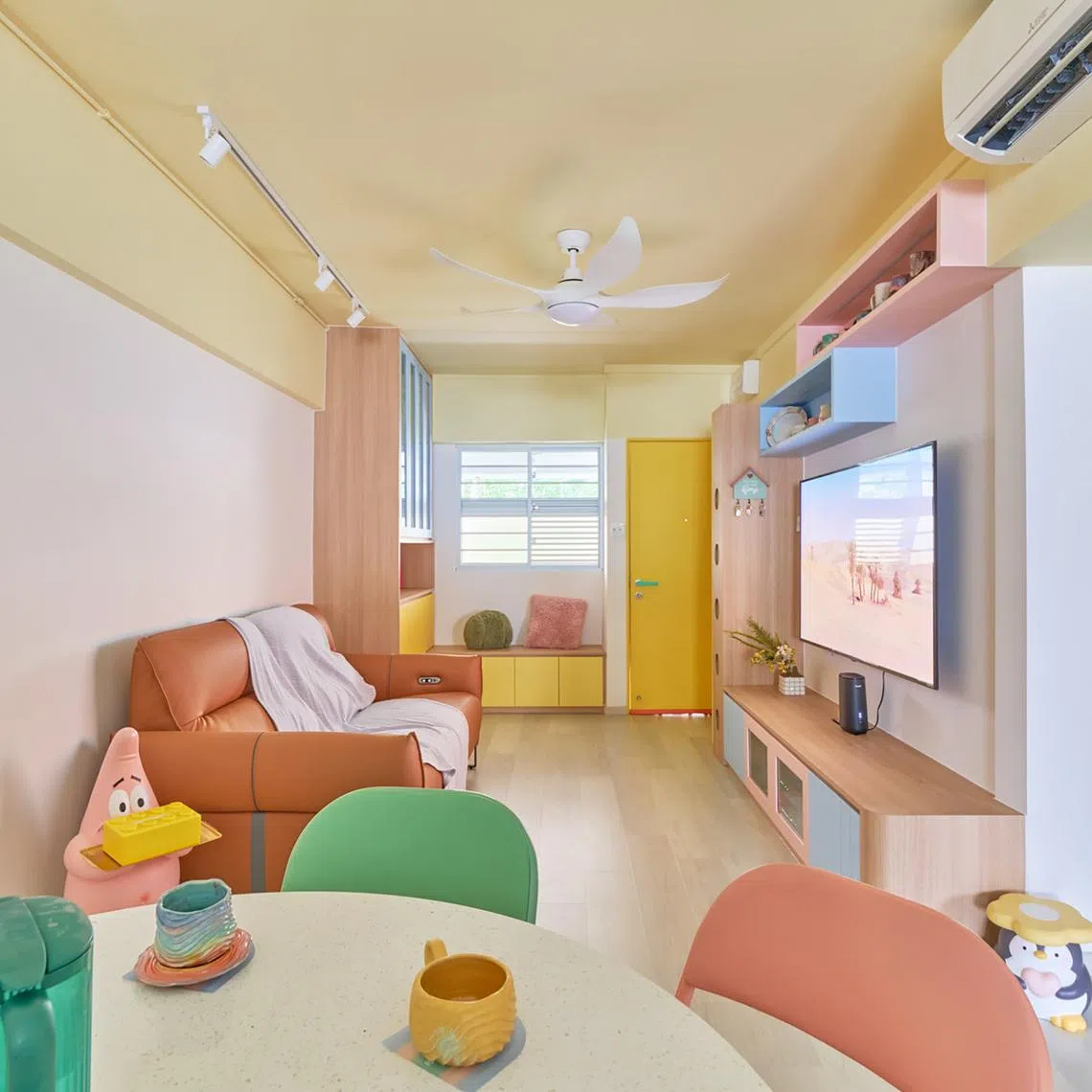 This Ang Mo Kio HDB flat is decked out in pops of pastel and quirky cartoon motifs.