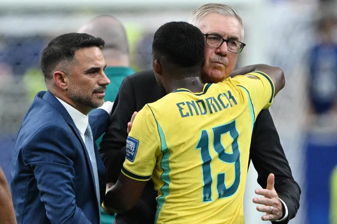 Soccer Football - FIFA World Cup 2026 - Round of 32 - Brazil v Japan - Houston Stadium, Houston, Texas, U.S. - June 29, 2026
Brazil's Endrick celebrates after the match with coach Carlo Ancelotti REUTERS/Annegret Hilse