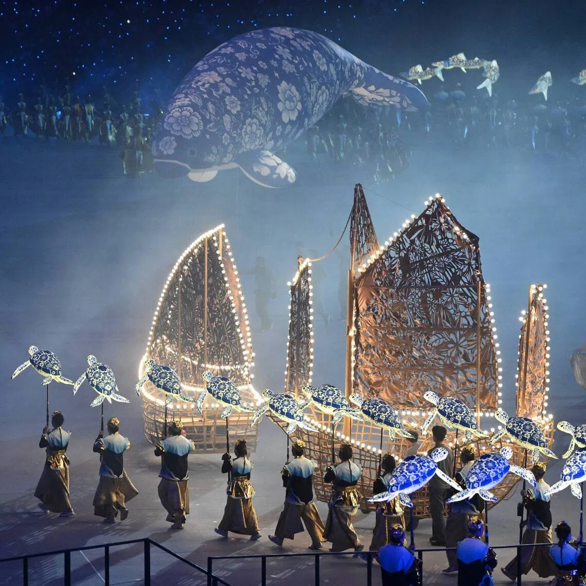 Performers from Soka Gakkai Singapore performing alongside marine animal puppets during Chapter 3 of National Day Parade 2026 at the National Stadium on Aug 9.