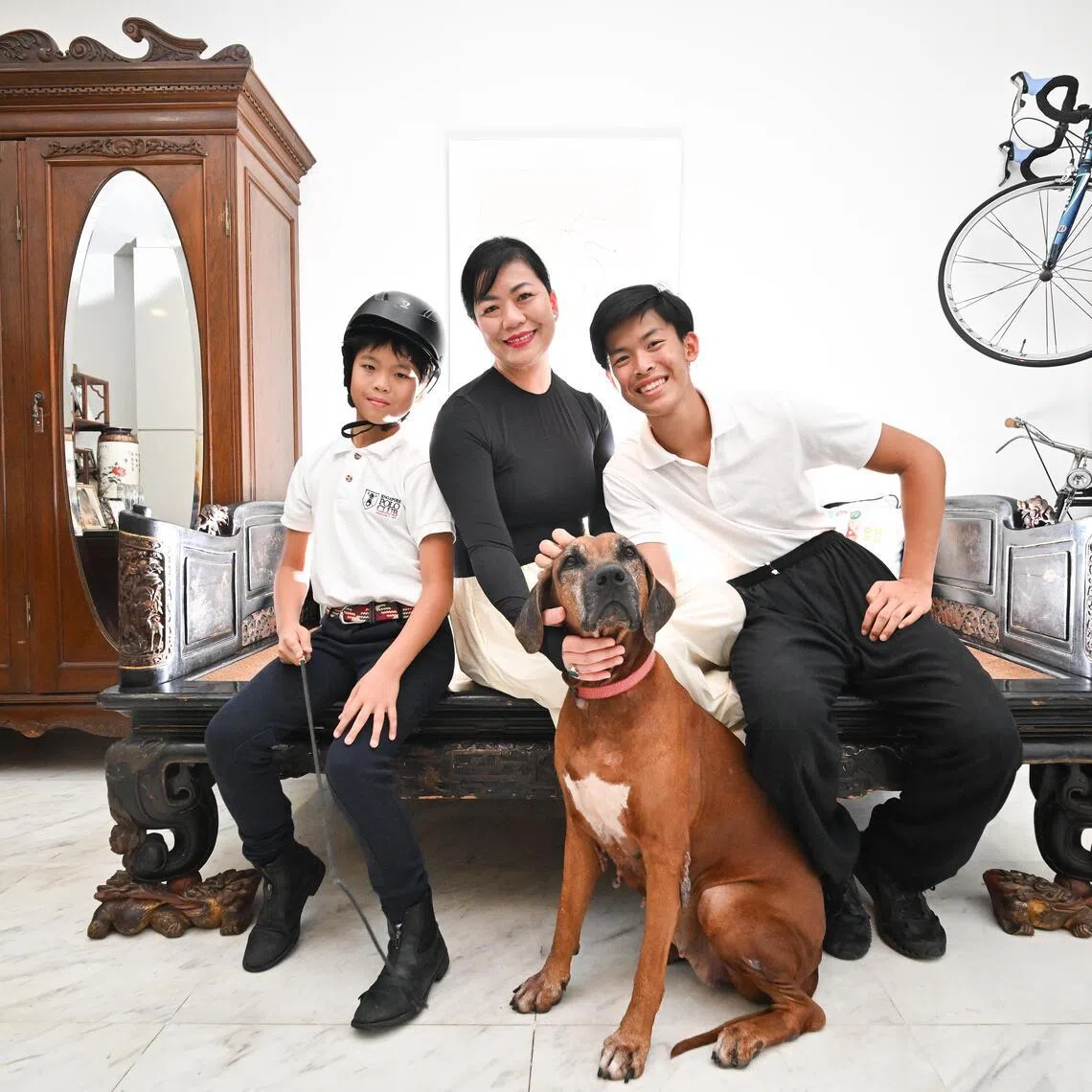 Dr Jade Kua encourages her sons Mark Xavier Teo (right) and Marcel Ian Teo to exercise during exam seasons.