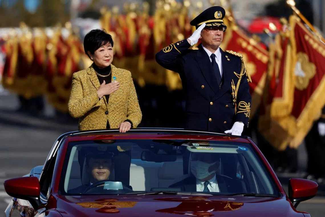 Tokyo Governor Yuriko Koike inspects the Tokyo Fire Department's New Year's Fire review in Tokyo, Japan January 6, 2023.  REUTERS/Issei Kato/File Photo