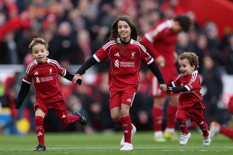 Two of Diogo Jota’s children, Dinis (left) and Duarte (right) walk on the pitch ahead of the EPL match between Liverpool and Wolverhampton Wanderers on Dec 27.