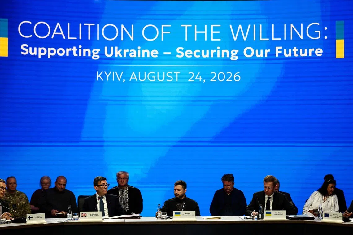 British Prime Minister Andy Burnham (centre left) and Ukrainian President Volodymyr Zelensky (centre) at a meeting of the Coalition of the Willing, in Kyiv, Ukraine, on Aug 24.