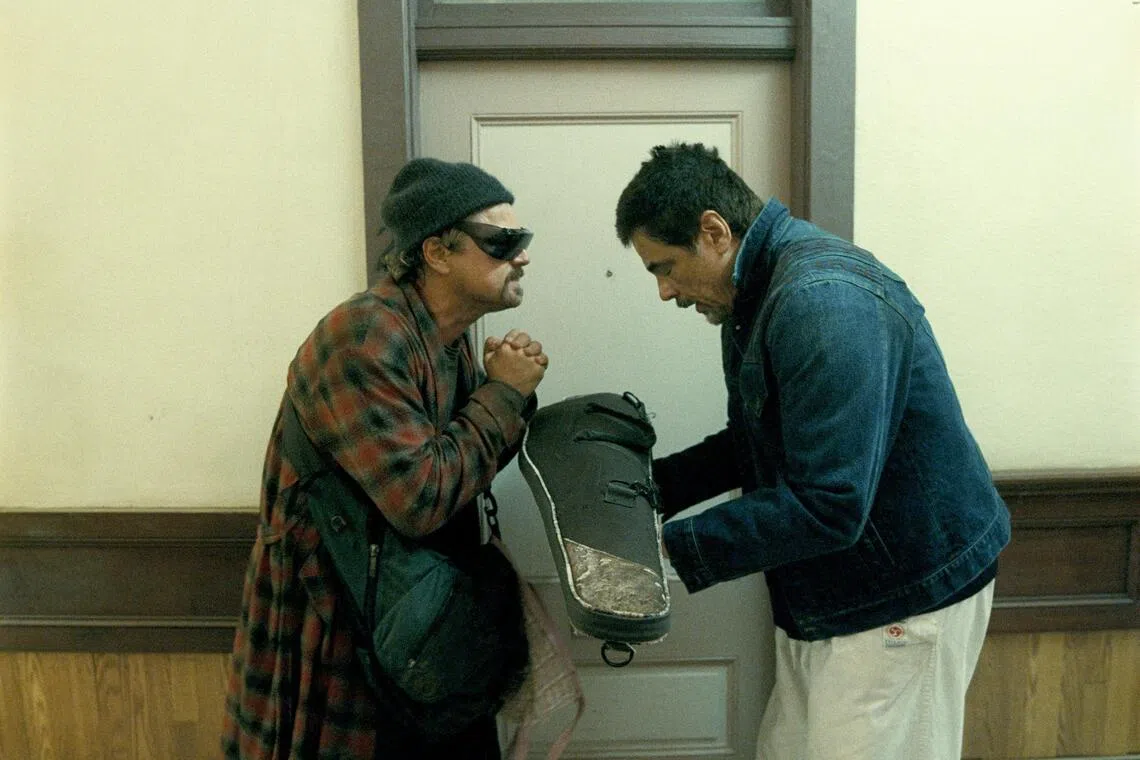 jomovie24a - From left: Leonardo DiCaprio and Benicio del Toro in the drama One Battle After Another.

given caption: There are big question marks over whether film studios still need Hollywood stars such as Leonardo DiCaprio (left) and Benecio Del Toro when they could be replaced by AI-generated replicas.

Source: WBEI 2025