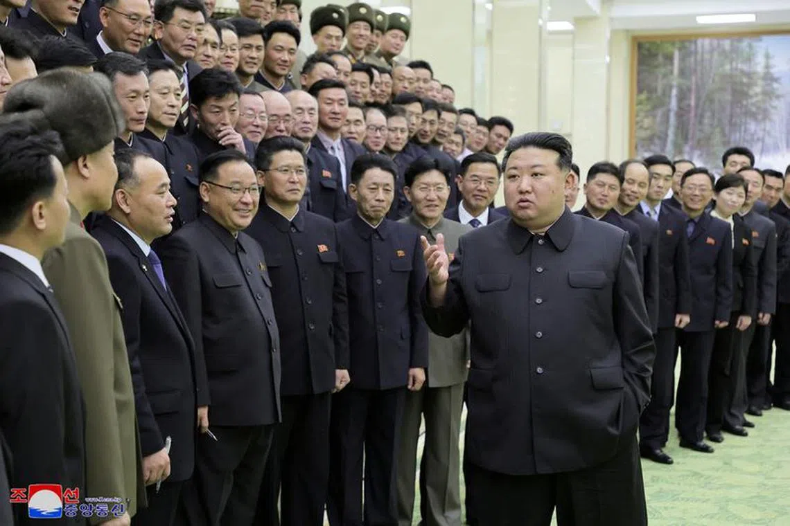 North Korea's leader Kim Jong-un meets with members of the Non-Standing Satellite Launch Preparation Committee, in this picture released by the Korean Central News Agency on November 24, 2023. KCNA via REUTERS