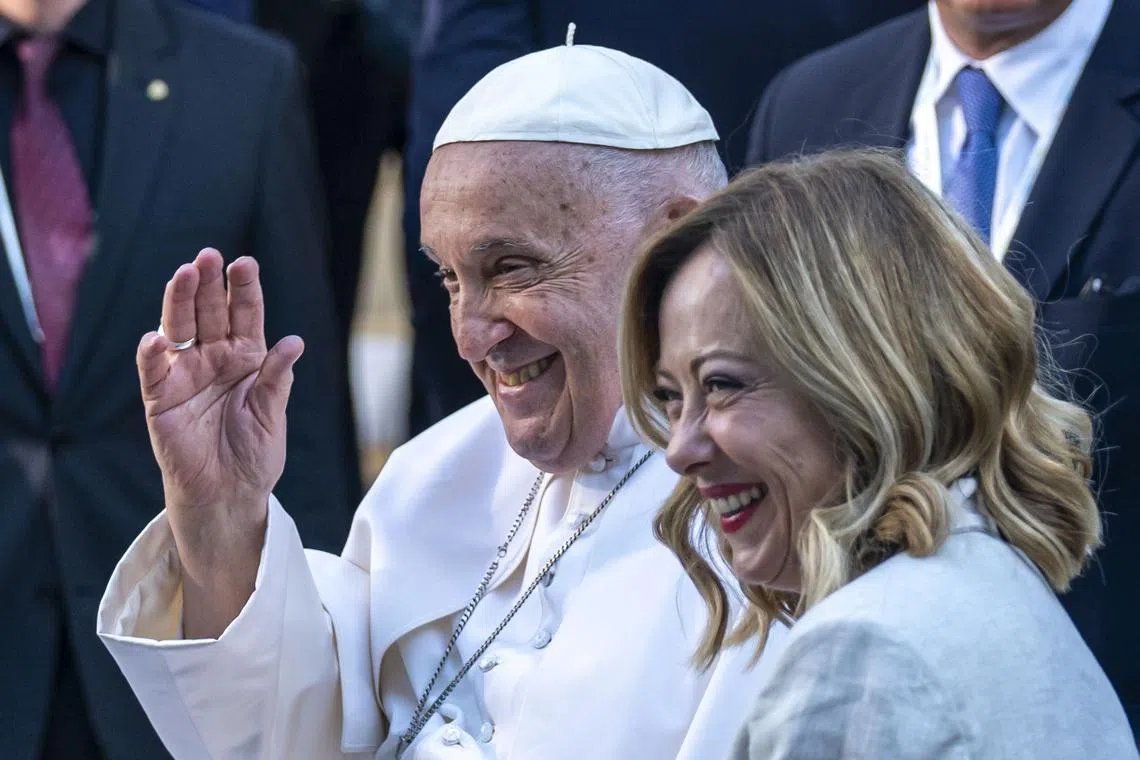 Pope Francis and Italian Prime Minister Giorgia Meloni are pictured together at a Group of 7 meeting in Italy in 2024.