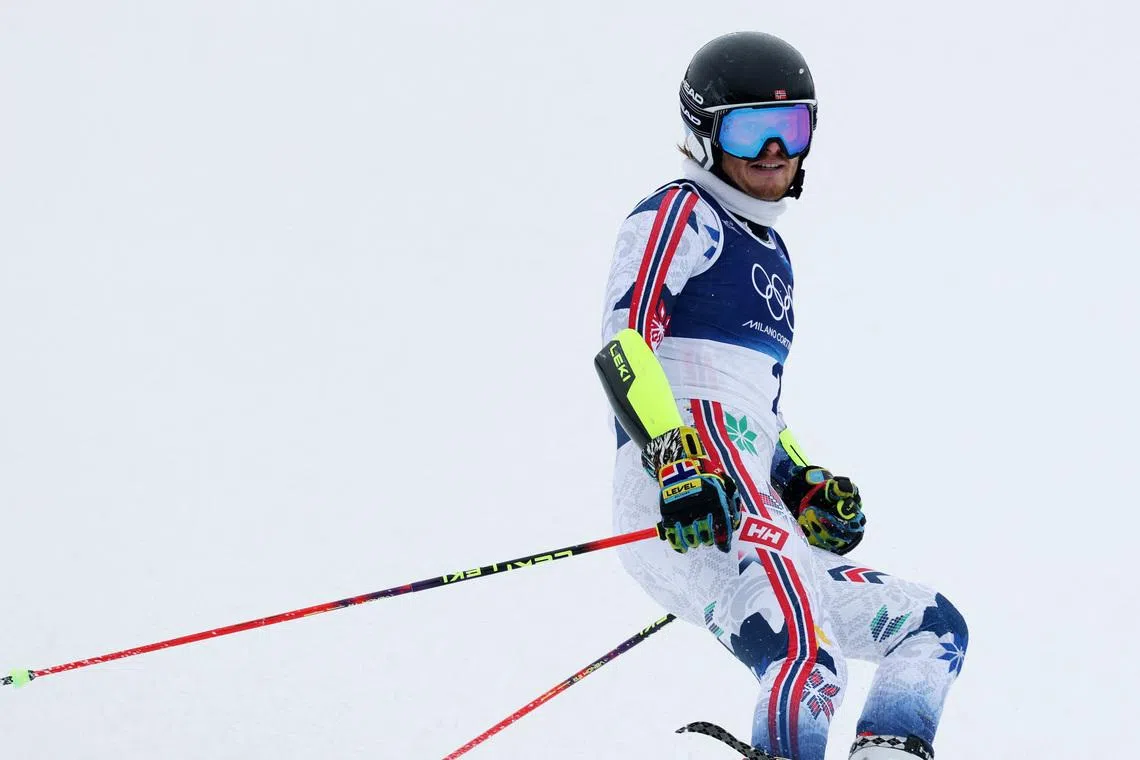Alpine skiing-Norway's McGrath leads crash-strewn men's slalom, Pinheiro Braathen exits