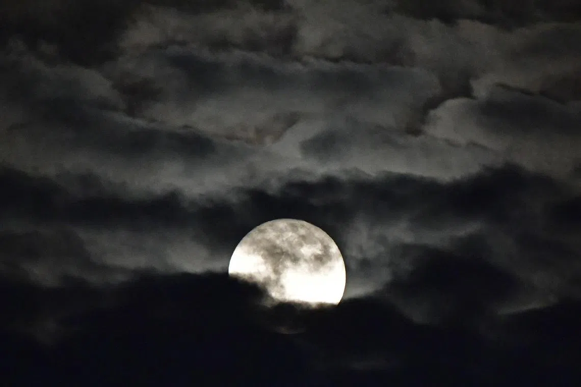 The lunar phenomenon occurs when the moon’s orbit is closer to Earth, making the moon appear larger and brighter than usual.