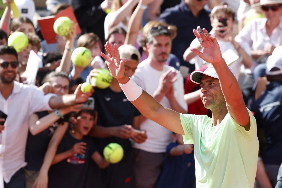Tennis - French Open - Roland Garros, Paris, France - May 25, 2024 Spain's Rafael Nadal acknowledges fans during a practice session REUTERS/Gonzalo Fuentes