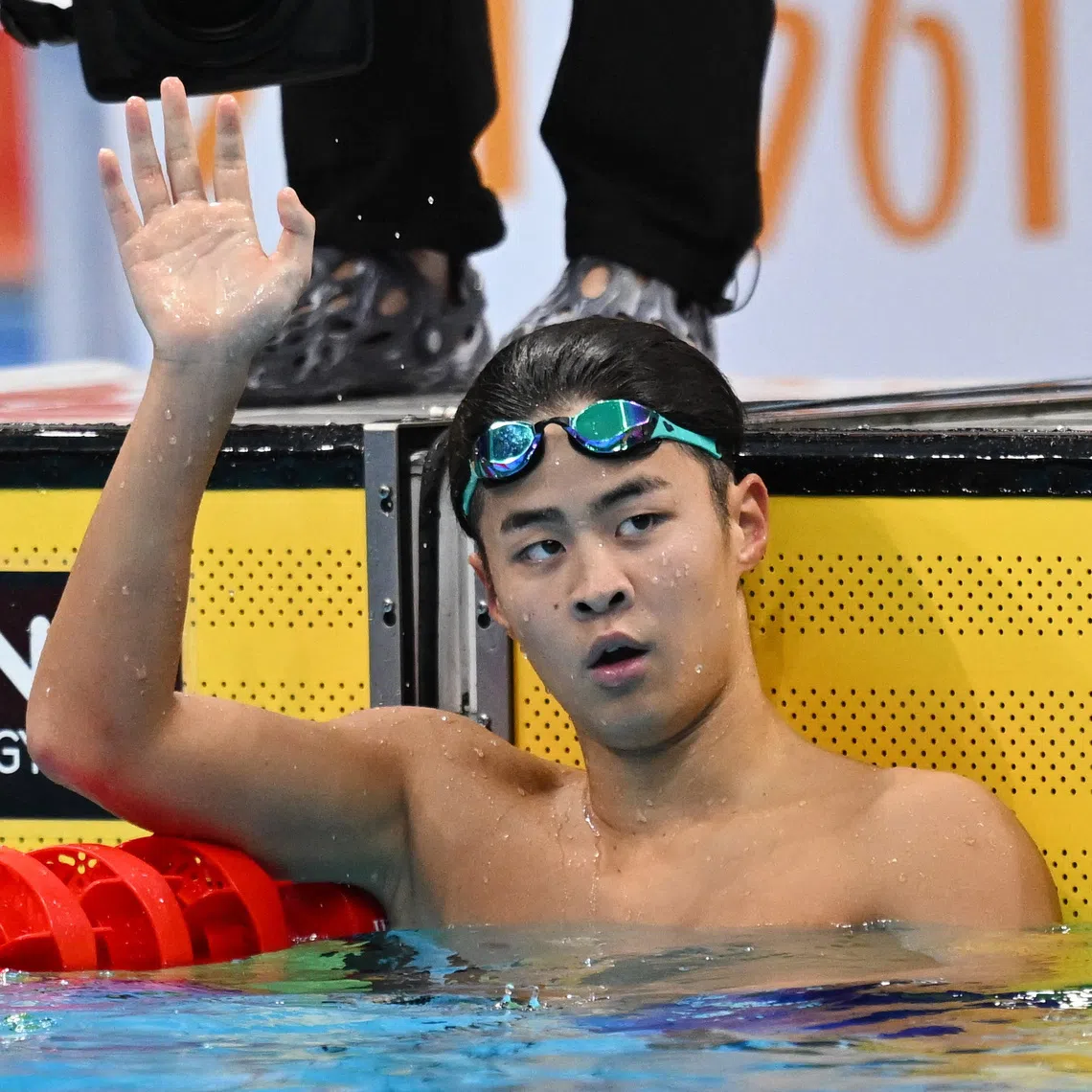 Asian Games - Aichi-Nagoya 2026 - Swimming - Tokyo Aquatics Centre, Koto, Tokyo, Japan - September 22, 2026  Japan's Yumeki Kojima celebrates winning the men's 400m individual medley final REUTERS/Andy Chua