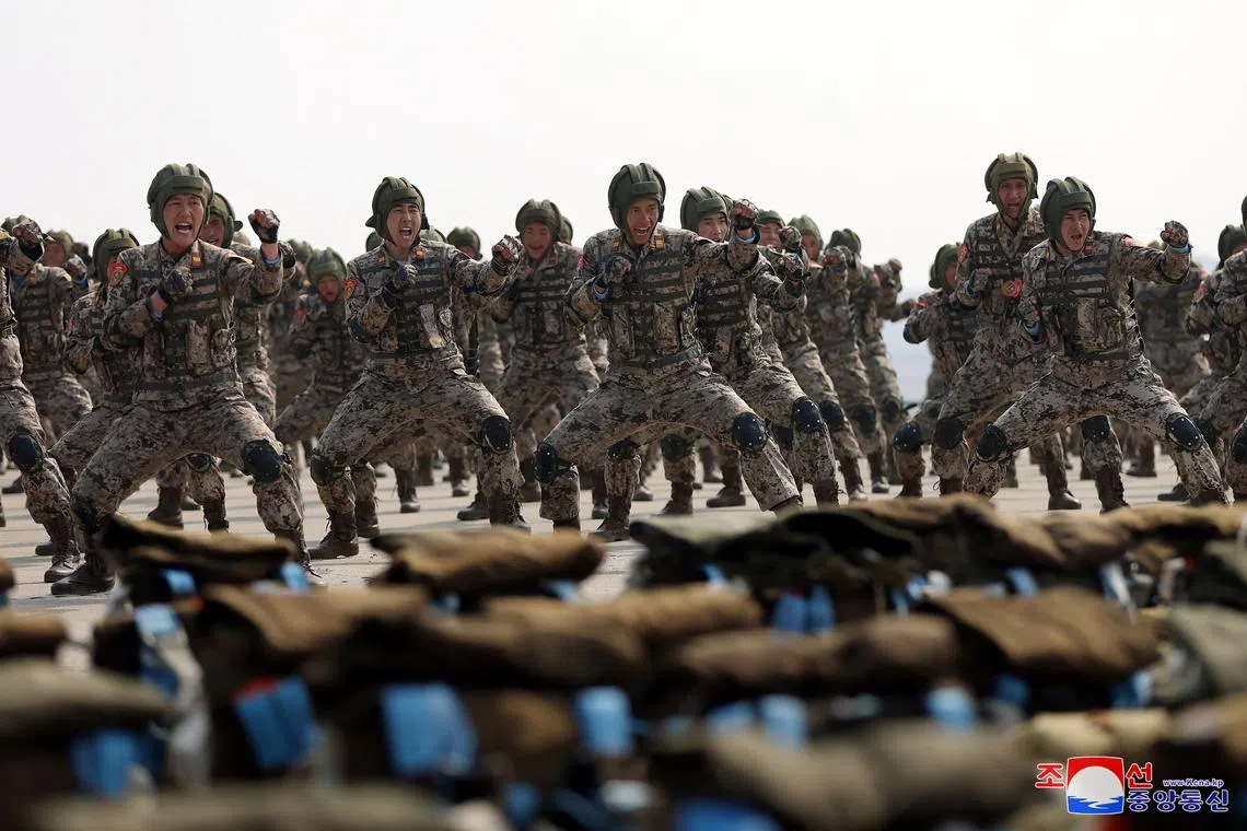FILE PHOTO: Soldiers participate in a demonstration during the training of the Korean People's Army's air and amphibious combat units, in this picture released on March 16, 2024, by the Korean Central News Agency.  KCNA via REUTERS/File Photo