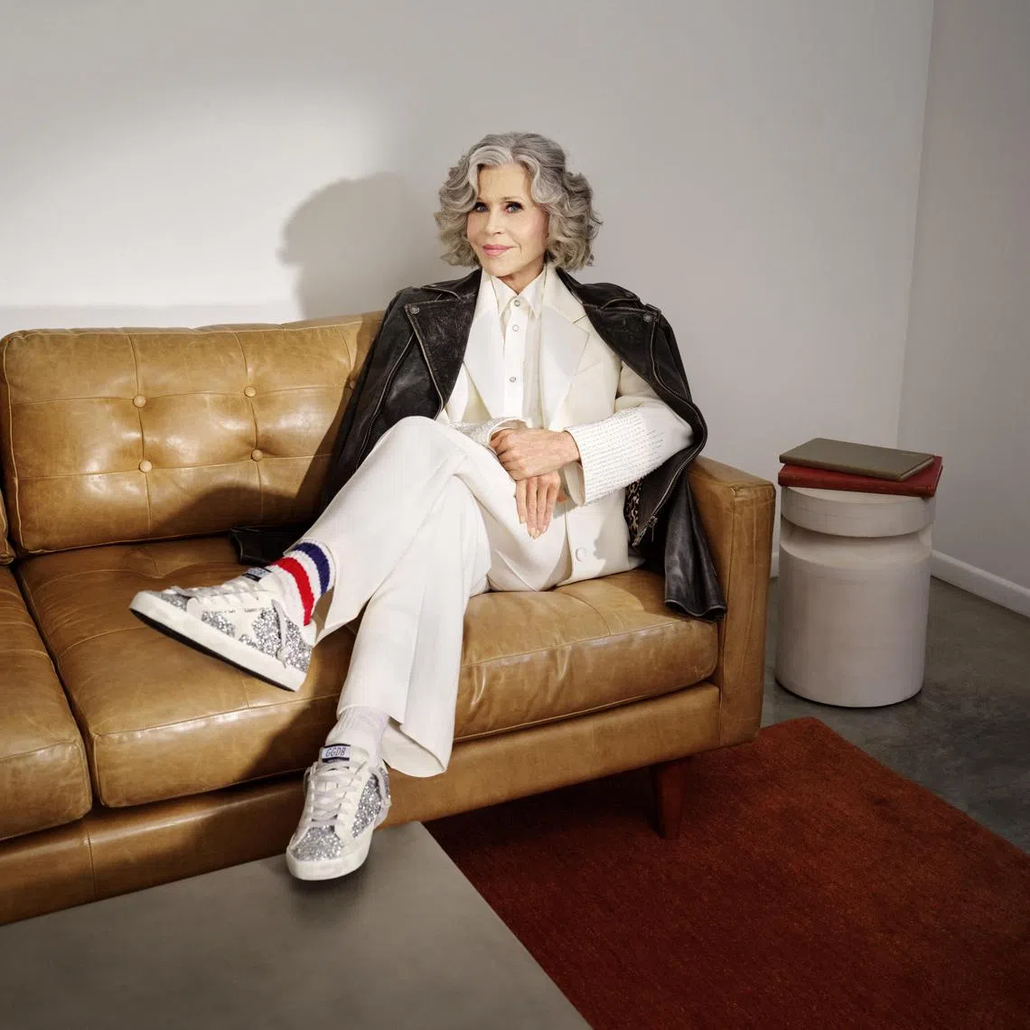 A photo provided by Golden Goose shows Jane Fonda, in a scene from her new sneaker campaign. Fonda said she began wearing Golden Goose shoes after seeing them in a store while making a “Book Club” movie in Rome. (Golden Goose via The New York Times) — NO SALES; FOR EDITORIAL USE ONLY WITH NYT STORY SLUGGED FONDA-SNEAKERS BY VANESSA FRIEDMAN FOR FEB. 18, 2025. ALL OTHER USE PROHIBITED. —