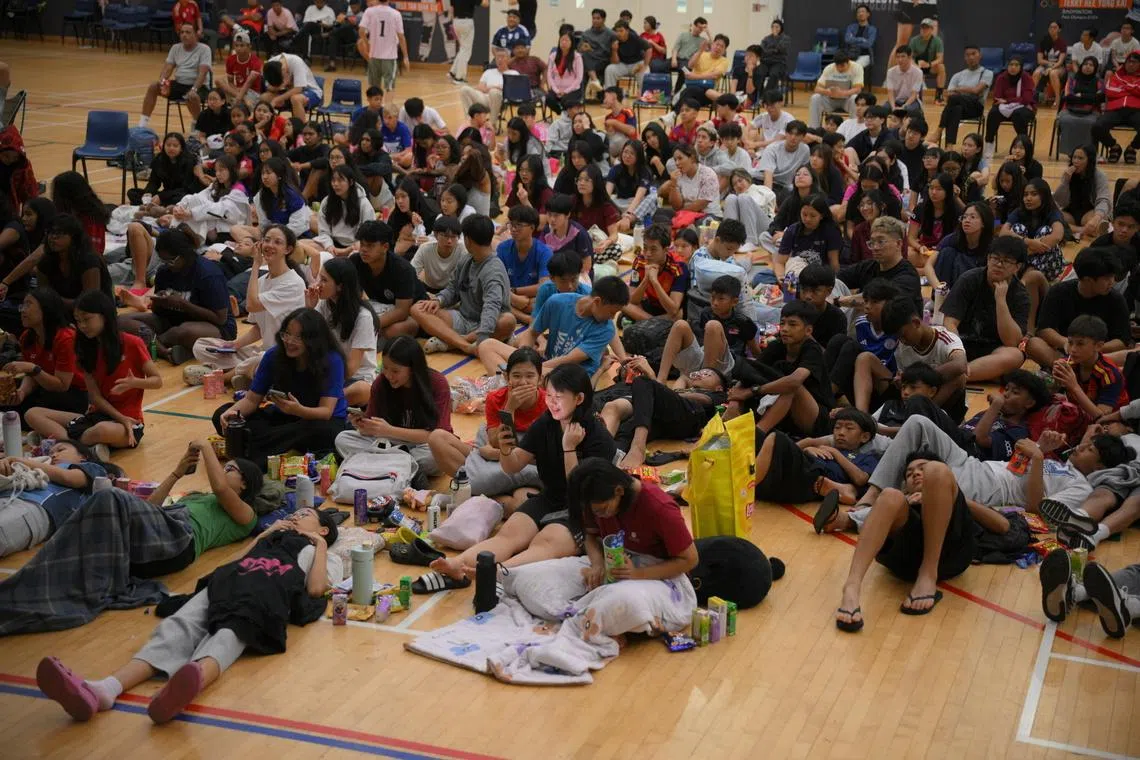 Students, parents and staff of Singapore Sports School (SSP) watch the screening of the World Cup Final at the SSP auditorium on July 20, 2026.