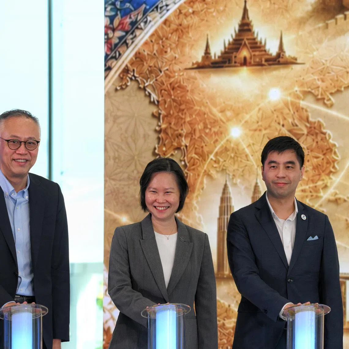 (From left) Lim Kok Kiang, Principal and CEO of Ngee Ann Polytechnic, Gan Siow Huang, Minister of State for Foreign Affairs and Trade and Industry, and Jason Bay, Chairperson of the SEA Advisory Panel, Ngee Ann Polytechnic, launch SEA Unbound at Ngee Ann Polytechnic Convention Centre.