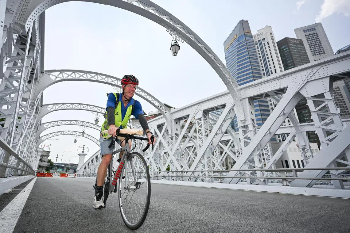 ST20241022-202460600357-Lim Yaohui-Kimberly Kwek-kkrace/
Race route measurer Kim Vivian, 60, doing Standard Chartered Singapore Marathon race route measurements at Anderson Bridge on Oct 22, 2024.
Story on what it takes to be a race route measurer for marathons such as the Standard Chartered Singapore Marathon (SCSM).
Opportunity to catch SCSM 2024’s own course measurer, Kim Vivian, in action as he carefully and painstakingly measures out the planned race route along key landmarks that include Gardens by the Bay, Anderson Bridge, and more. He will explain in detail what it takes to be a race route measurer and what measuring techniques and tools are needed to accurately measure a 42km run.
(ST PHOTO: LIM YAOHUI)
