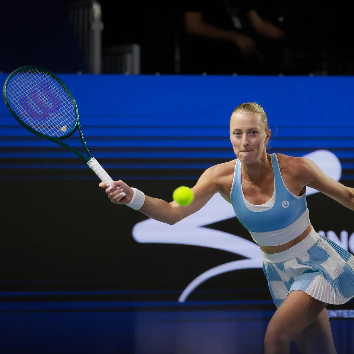 France’s Kristina Mladenovic playing a return to Japan’s Nao Hibino in the women’s singles round of 32 of the Singapore Tennis Open at OCBC Arena on Sept 21.