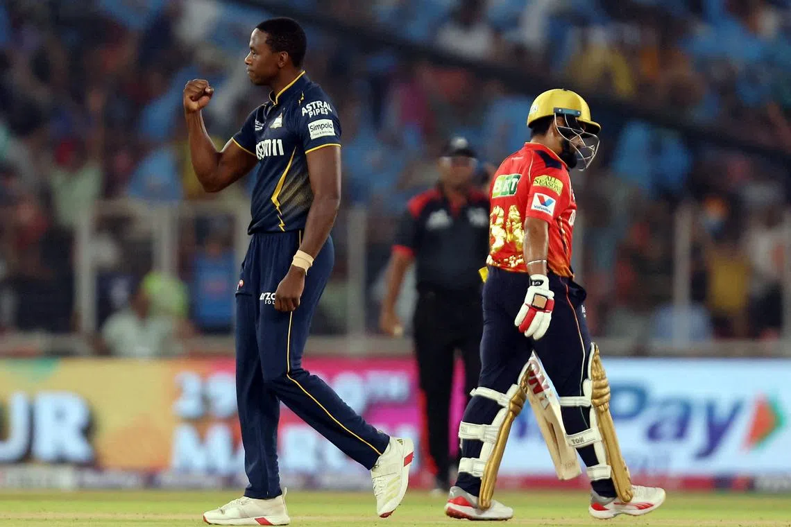 FILE PHOTO: Cricket - Indian Premier League - IPL - Gujarat Titans v Punjab Kings - Narendra Modi Stadium, Ahmedabad, India - March 25, 2025 Gujarat Titans' Kagiso Rabada celebrates after taking the wicket of Punjab Kings' Prabhsimran Singh, caught out by Arshad Khan REUTERS/Amit Dave/File Photo