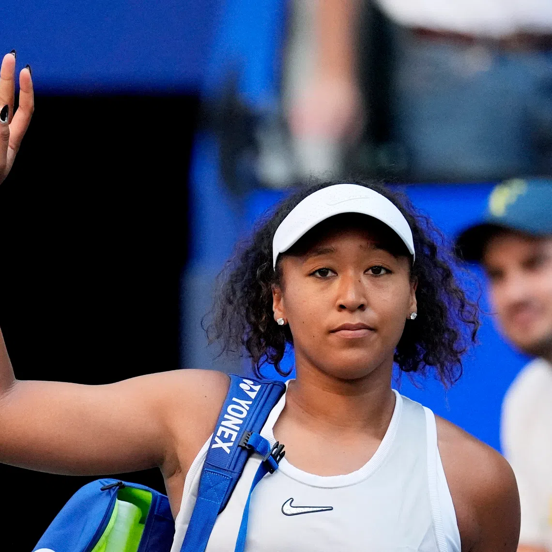 Japan’s Naomi Osaka acknowledging fans after losing her US Open round-of-16 match against Kazakhstan’s Elena Rybakina.