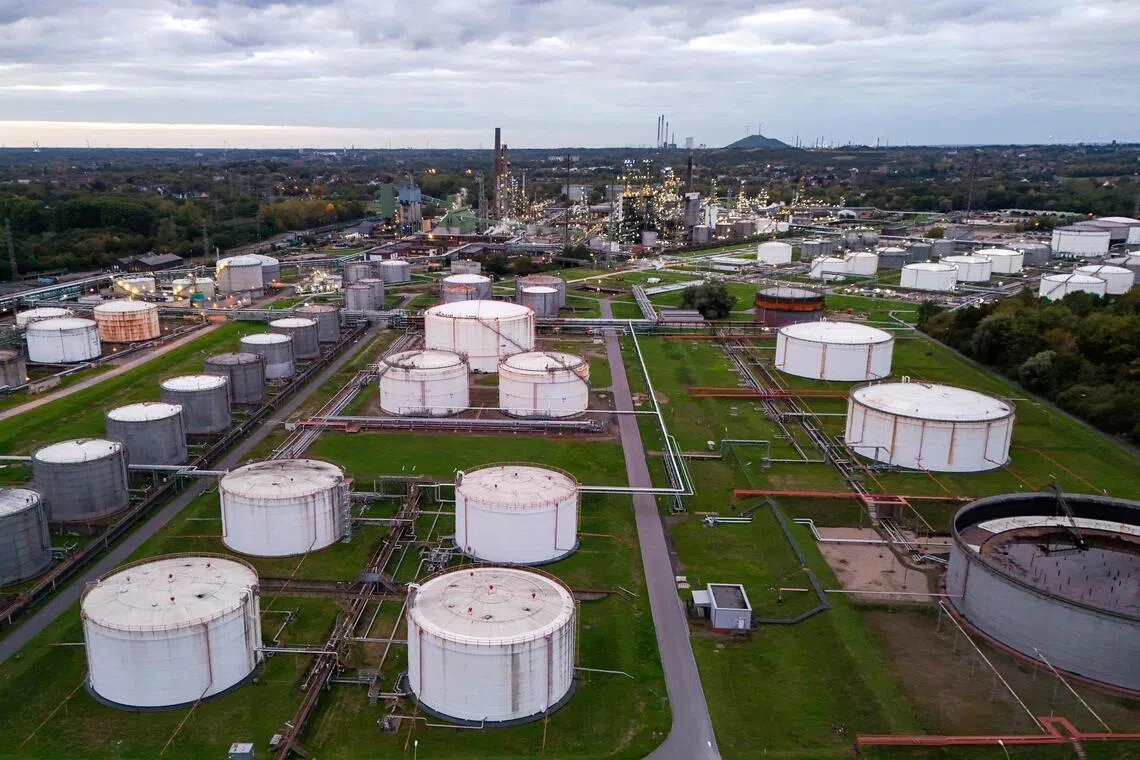 Shares stumble, oil rises as markets await AI sector results | The ...