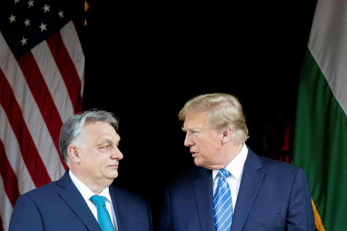 Hungarian Prime Minister Viktor Orban (left) has openly endorsed Republican Donald Trump’s bid for the US presidency after meeting Trump in Florida.