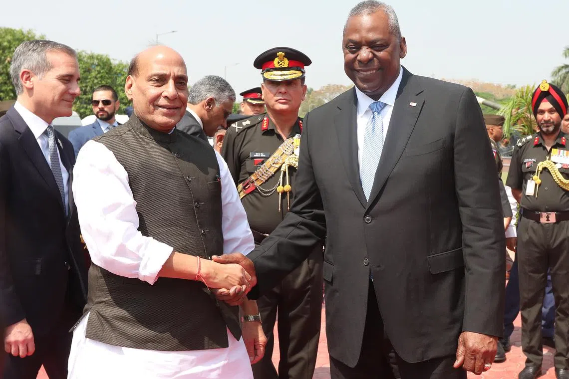 Indian Defence Minister Rajnath Singh (second from left) welcomes US Defence Secretary Lloyd Austin, in New Delhi, on June 5.