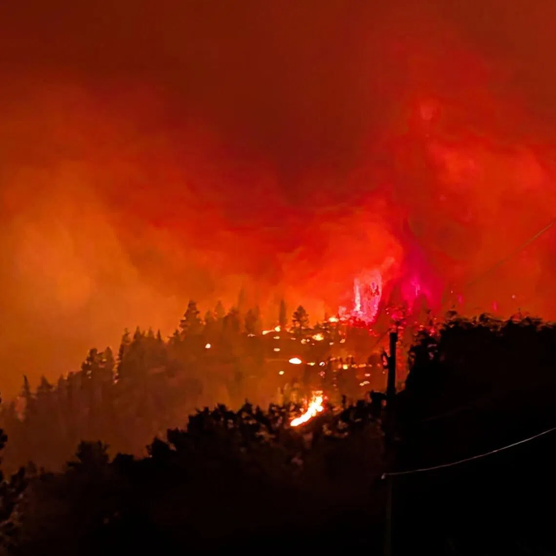 Over 20,000 have evacuated; officials warn drought-like conditions could worsen the crisis.