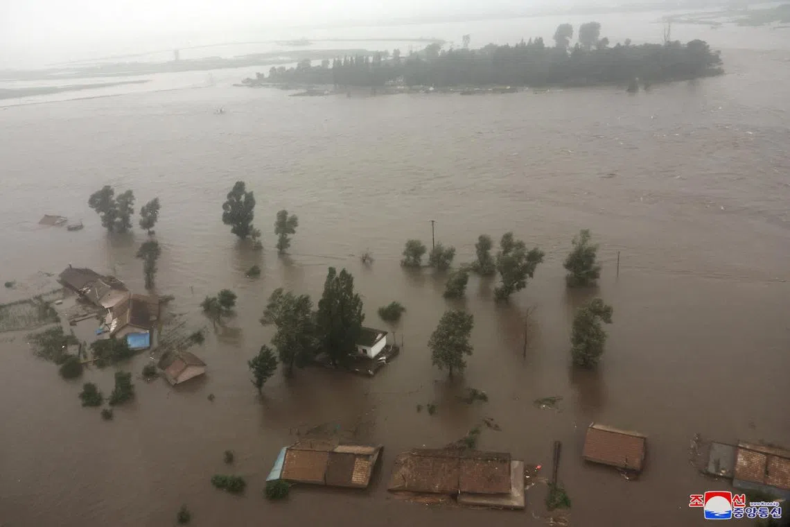 FILE PHOTO: A view of a flooded area near the country's border with China, which has been hit by heavy rainfall from Tropical Storm Gaemi, in North Pyongan Province, North Korea, July 28, 2024 in this photo released by North Korea's official Korean Central News Agency.    KCNA via REUTERS/File Photo