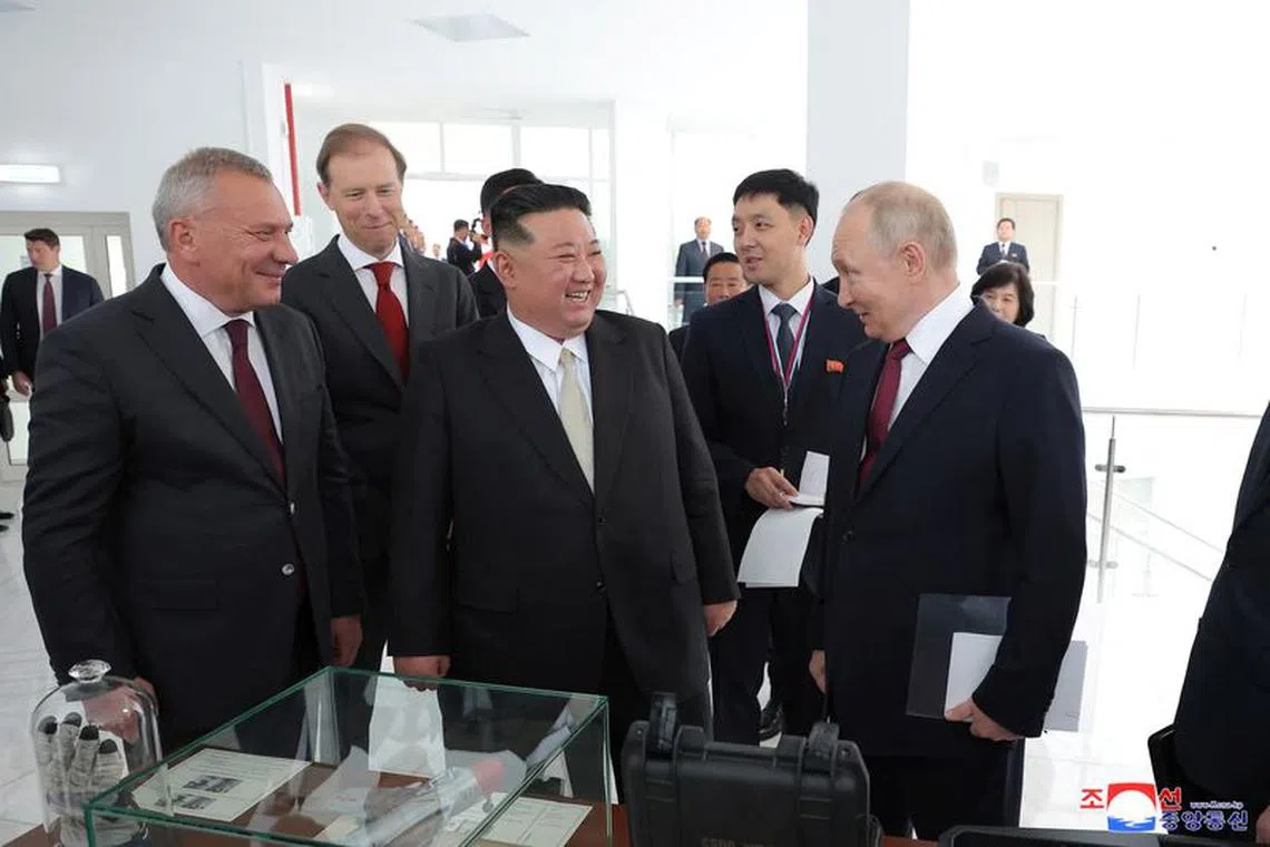 North Korean leader Kim Jong Un and Russia's President Vladimir Putin talk during a tour, in Russia, September 13, 2023 in this image released by North Korea's Korean Central News Agency.   KCNA via REUTERS/File Photo