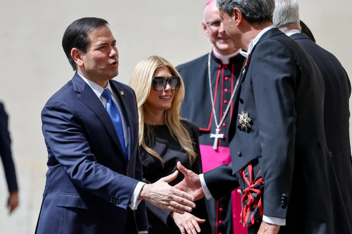 U.S. Secretary of State Marco Rubio and his wife Jeanette Dousdebes Rubio arrive at the San Damaso courtyard to meet Pope Leo XIV at the Vatican, May 7, 2026. REUTERS/Yara Nardi