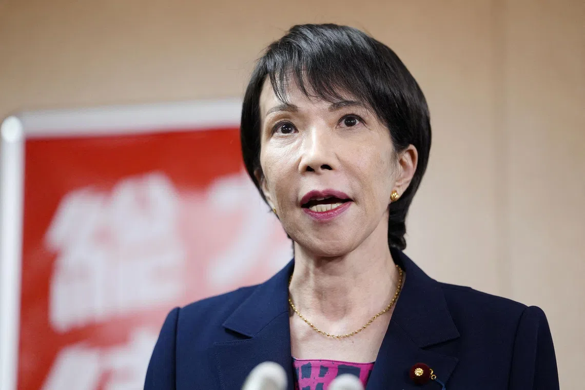 Japan's Liberal Democratic Party newly elected chief Sanae Takaichi speaks to media after a meeting with Japan's Komeito party leader Tetsuo Saito, at the party headquarters, in Tokyo, Japan October 10, 2025, in this photo taken by Kyodo. Kyodo/via REUTERS