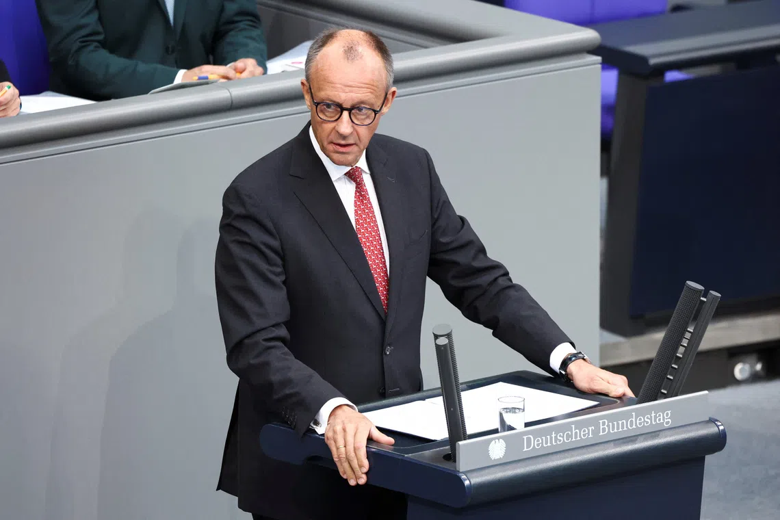 German Chancellor Friedrich Merz speaks at the 2025 budget debate of the lower house of parliament Bundestag in Berlin, Germany, September 17, 2025. REUTERS/Liesa Johannssen