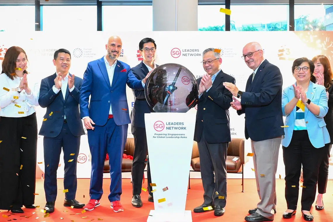 Deputy Prime Minister Gan Kim Yong (fourth from right) launching the next phase of the Singapore Leader's Network new initiatives on Sept 8.