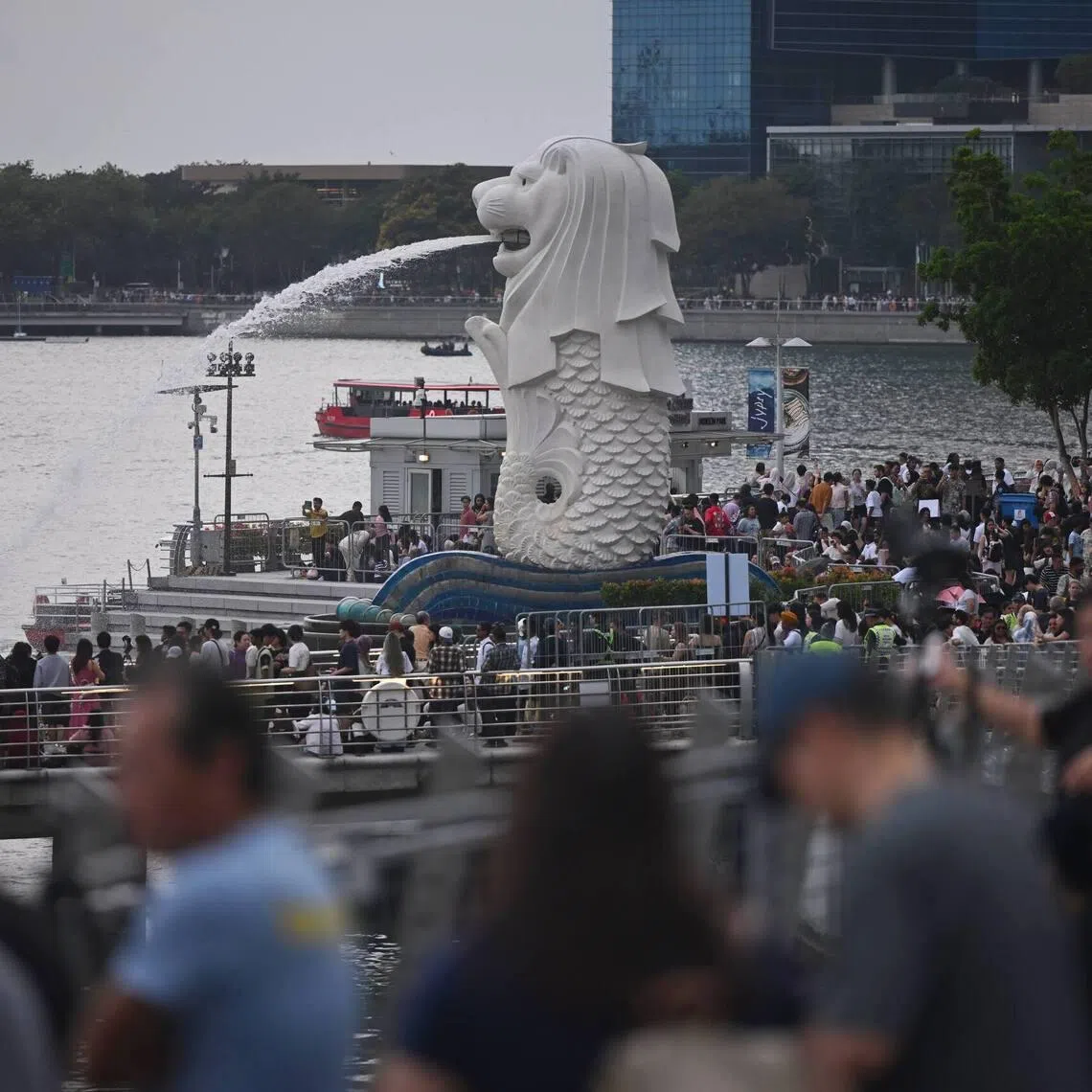 Crowd at Merlion Park ahead of the New Year’s celebration on Dec 31, 2025. 
