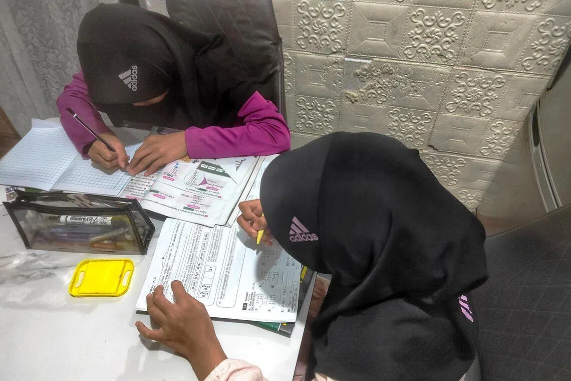 4 schoolkids at home, 1 dying phone: Digital poverty is holding back Malaysia’s needy children