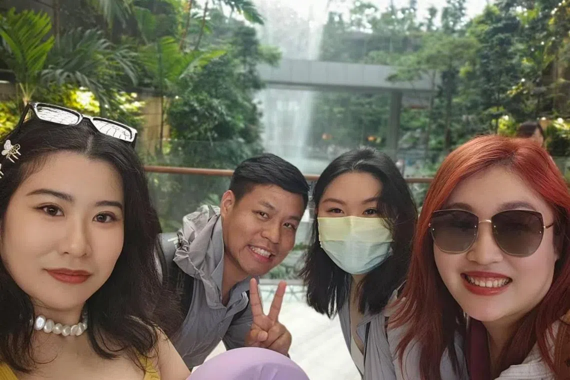 awtourism - Ms Wang Rui Xian (right, sunglasses) visited Singapore for a day en route to Maldives for a friend's wedding during Golden Week in China. She said that, while the weather was too hot, she still very much enjoyed her time in the Republic. She hopes to visit again, when it is less hot, to see the zoo and Universal Studios Singapore. STB expects the number of Chinese tourists this year to be at least 30 per cent of the 3.63 million pre-pandemic. So far, it is only at 20 per cent. 


under Foreign
Image name: wang rui xian
By and Copyright: Handout by Wang Rui Xian