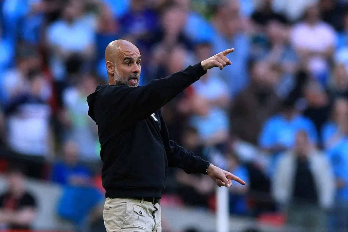 FILE PHOTO: Soccer Football - FA Cup - Semi Final - Manchester City v Southampton - Wembley Stadium, London, Britain - April 25, 2026 Manchester City manager Pep Guardiola reacts during the match Action Images via Reuters/Paul Childs/File Photo