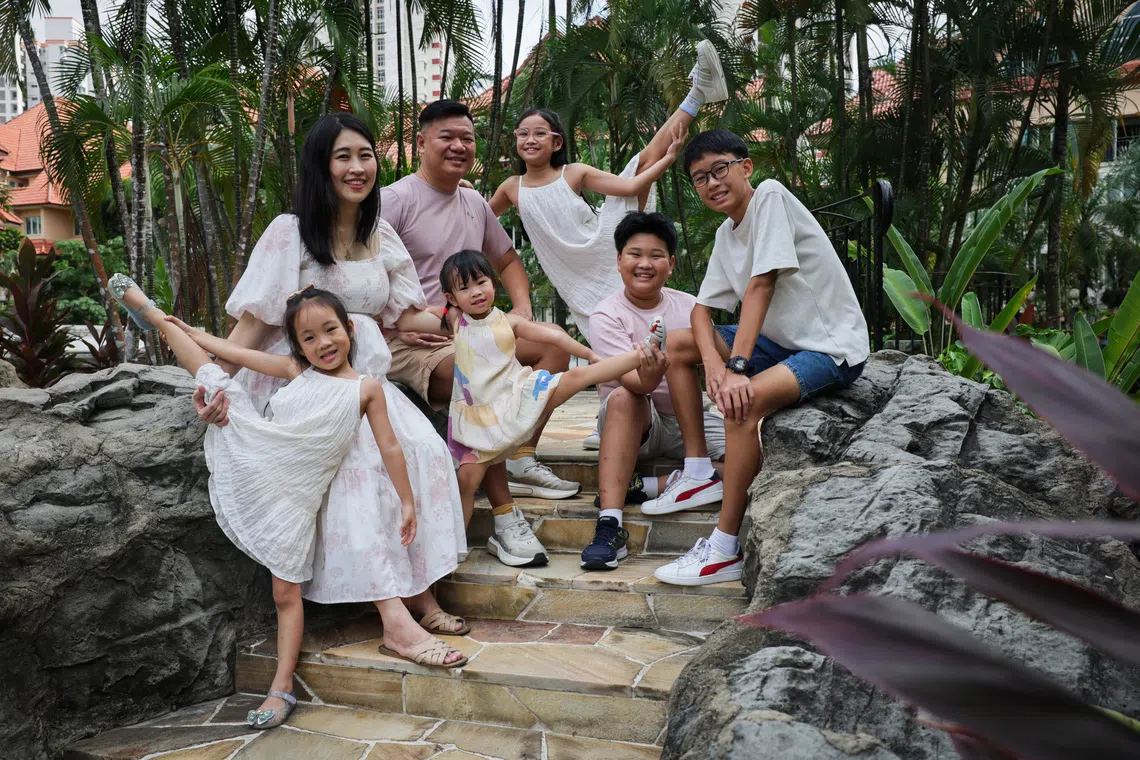 Clement Chua and Kelly Ang together with their children.