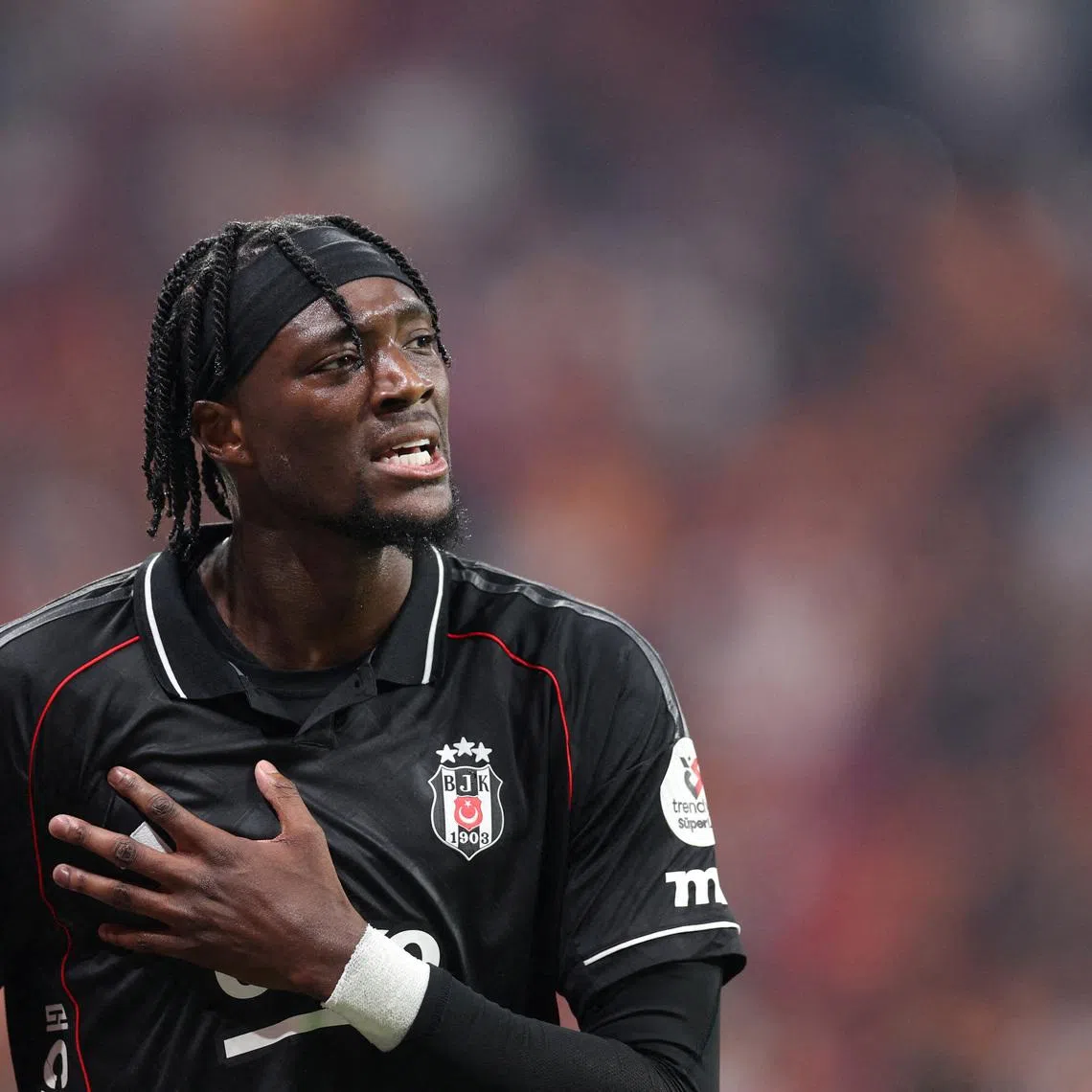 FILE PHOTO: Soccer Football - Super Lig - Galatasaray vs Besiktas - Rams Park, Istanbul, Turkey - October 4, 2025 Besiktas' Tammy Abraham reacts after sustaining an injury REUTERS/Murad Sezer/File Photo