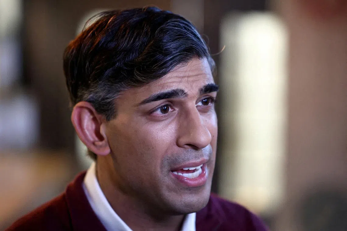 FILE PHOTO: Britain's Prime Minister Rishi Sunak speaks to the press during a visit to Omnom, a restaurant and community centre in London, Britain, May 6, 2024. HENRY NICHOLLS/File Photo